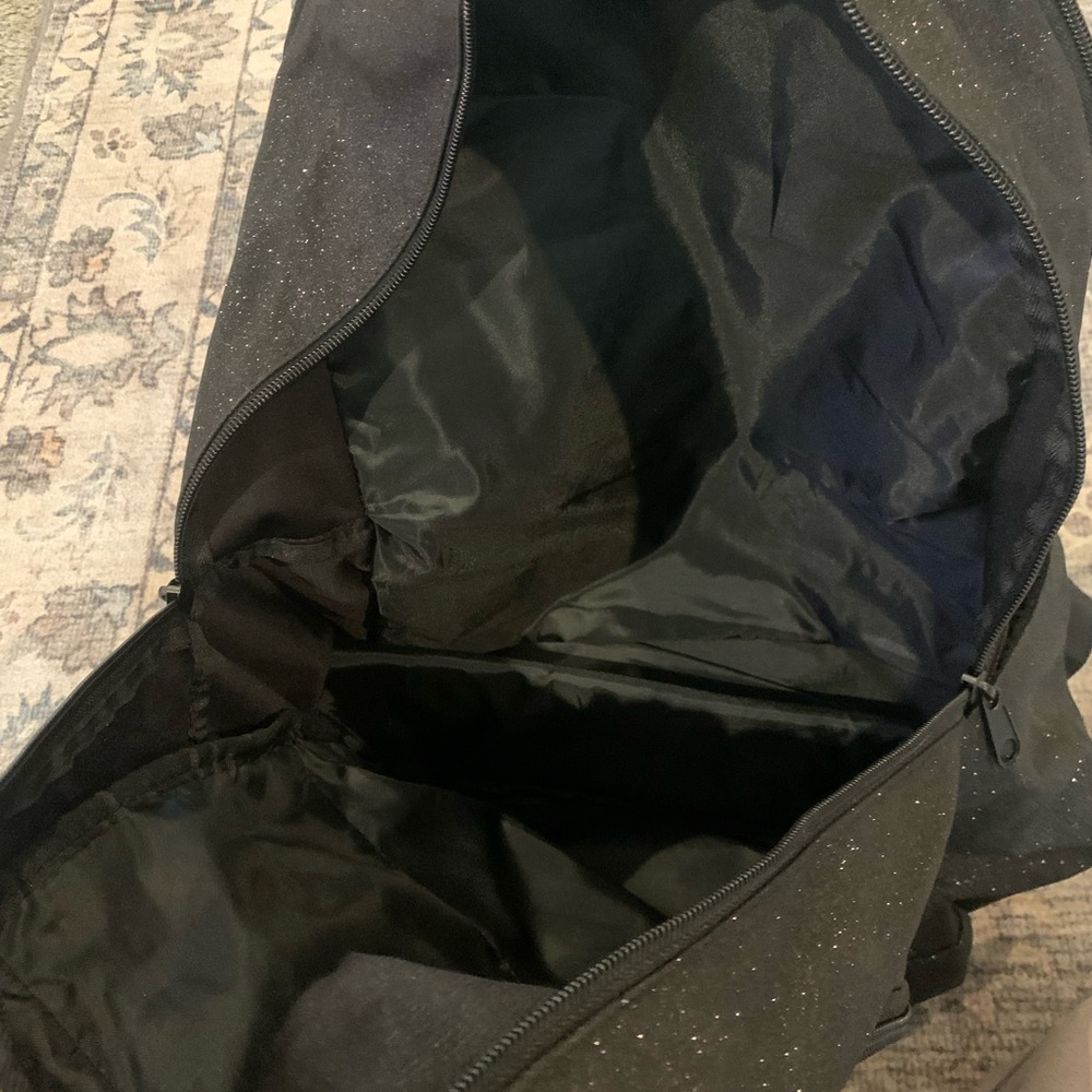 Durable Black Backpack With Multiple Compartments - image 4